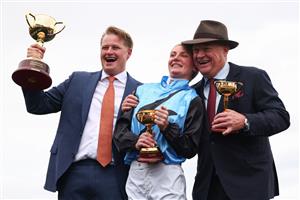 MELBOURNE, AUSTRALIA - NOVEMBER 04: Jamie Melham (C) celebrates with co trainers Tony McEvoy (R) and Calvin McEvoy after riding Half Yours during Melbourne Cup Day at Flemington Racecourse on November 04, 2025 in Melbourne, Australia. (Photo by Daniel Pockett/Getty Images)