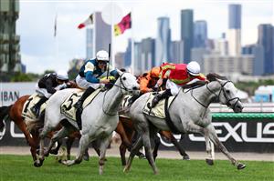 MELBOURNE, AUSTRALIA - NOVEMBER 04: John Allen rides Kingswood to win race six the Kirin Ichiban Plate during Melbourne Cup Day at Flemington Racecourse on November 04, 2025 in Melbourne, Australia. (Photo by Morgan Hancock/Getty Images)