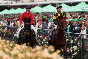 MELBOURNE, AUSTRALIA - NOVEMBER 04: Kerrin McEvoy rides Dance To The Boom back to the mounting yard after winning race nine The Hong Kong Jockey Club Stakes during Melbourne Cup Day at Flemington Racecourse on November 04, 2025 in Melbourne, Australia. (Photo by Morgan Hancock/Getty Images)