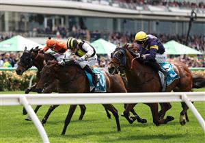 MELBOURNE, AUSTRALIA - NOVEMBER 04: Mark Zahra rides #10 Party Crasher to win race two the Ma Services Grand Handicap during Melbourne Cup Day at Flemington Racecourse on November 04, 2025 in Melbourne, Australia. (Photo by Robert Cianflone/Getty Images)