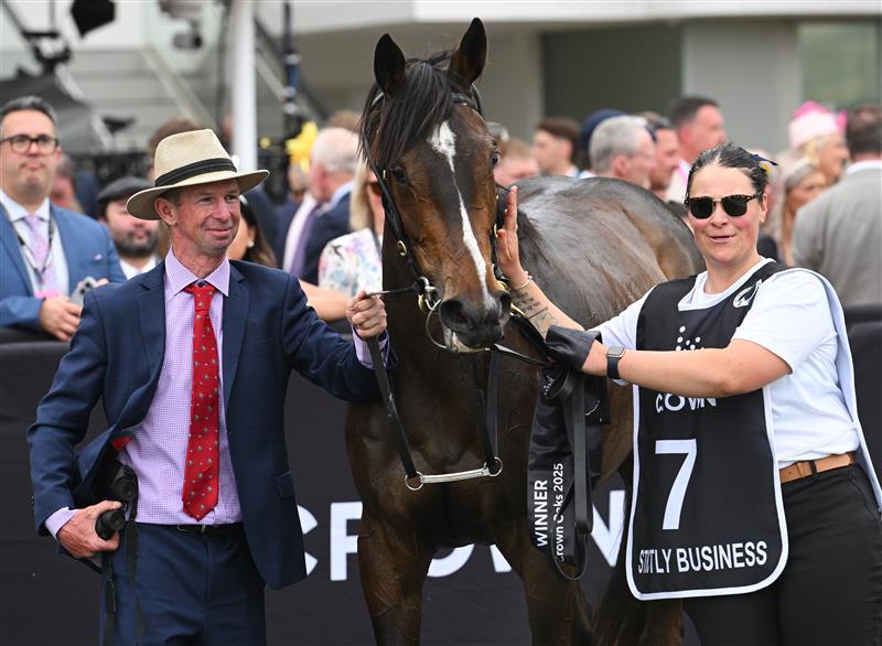 MELBOURNE, AUSTRALIA - NOVEMBER 06: Trainer Thomas Carberry poses with Strictly Business after winning Race 8, the Crown Oaks during Oaks Day at Flemington Racecourse on November 06, 2025 in Melbourne, Australia. (Photo by Vince Caligiuri/Getty Images)