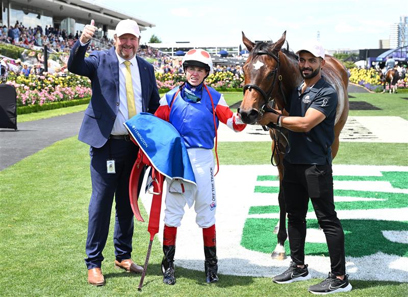 MELBOURNE, AUSTRALIA - NOVEMBER 06: Craig Williams poses with trainer Gary Portelli after riding Verona Rose to win Race 3, the Inglis Bracelet during Oaks Day at Flemington Racecourse on November 06, 2025 in Melbourne, Australia. (Photo by Vince Caligiuri/Getty Images)