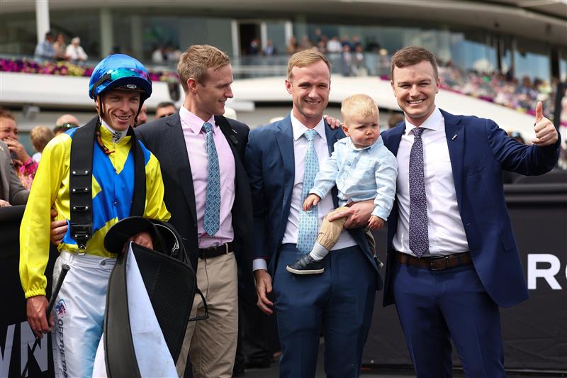 MELBOURNE, AUSTRALIA - NOVEMBER 06: Michael Dee poses with JD Hayes, Will Hayes & trainer Ben Hayes after riding Apulia to win race five the Channel 9 Chester Manifold Stakes during Oaks Day at Flemington Racecourse on November 06, 2025 in Melbourne, Australia. (Photo by Daniel Pockett/Getty Images)