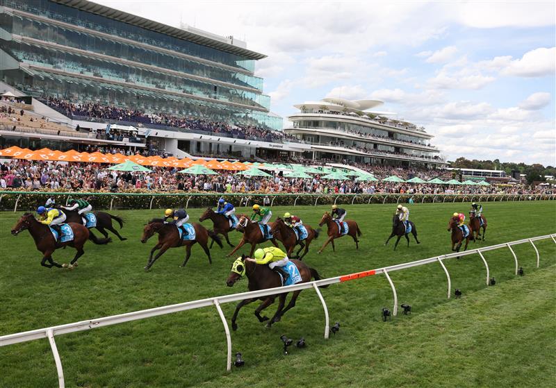 MELBOURNE, AUSTRALIA - NOVEMBER 06: Michael Dee rides #3 Apulia to win race five the Channel 9 Chester Manifold Stakes during Oaks Day at Flemington Racecourse on November 06, 2025 in Melbourne, Australia. (Photo by Robert Cianflone/Getty Images)