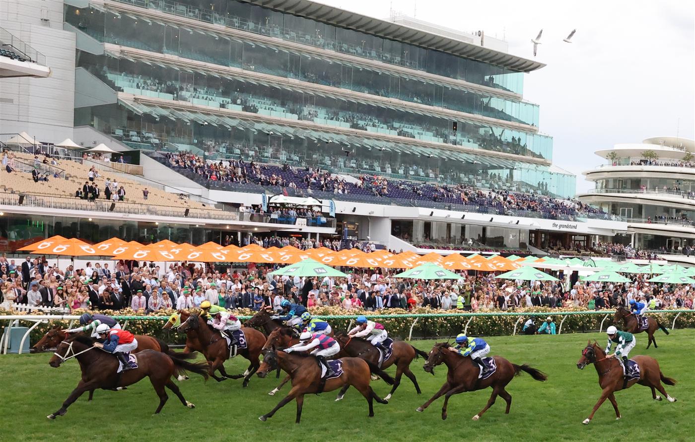 MELBOURNE, AUSTRALIA - NOVEMBER 06: Damian Lane rides Stokke #14 to win race nine the NYE at Flemington Century Stakes during Oaks Day at Flemington Racecourse on November 06, 2025 in Melbourne, Australia. (Photo by Robert Cianflone/Getty Images)