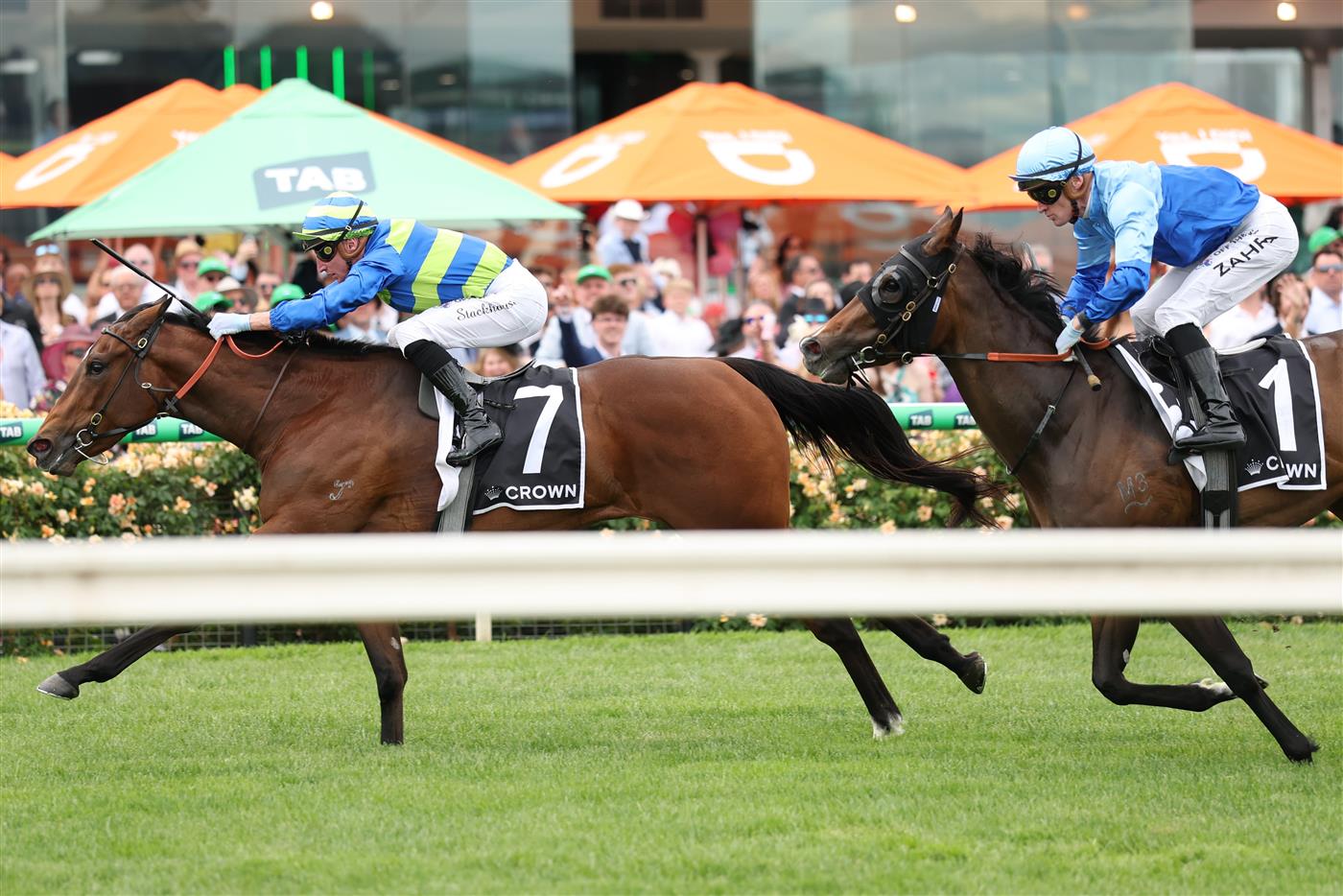 MELBOURNE, AUSTRALIA - NOVEMBER 06: Daniel Stackhouse rides #7 Point Barrow to win race six the Melbourne Cup Carnival Country Final Qc during Oaks Day at Flemington Racecourse on November 06, 2025 in Melbourne, Australia. (Photo by Robert Cianflone/Getty Images)