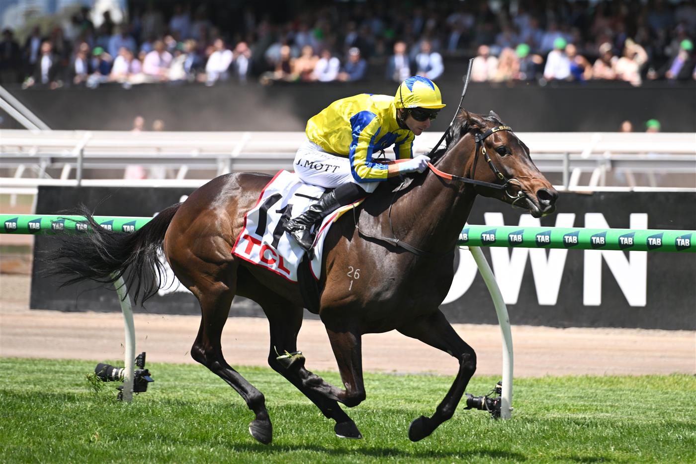 MELBOURNE, AUSTRALIA - NOVEMBER 06: Jamie Mott riding First Chorus winning Race 1, the Tcl Trophy during Oaks Day at Flemington Racecourse on November 06, 2025 in Melbourne, Australia. (Photo by Vince Caligiuri/Getty Images)