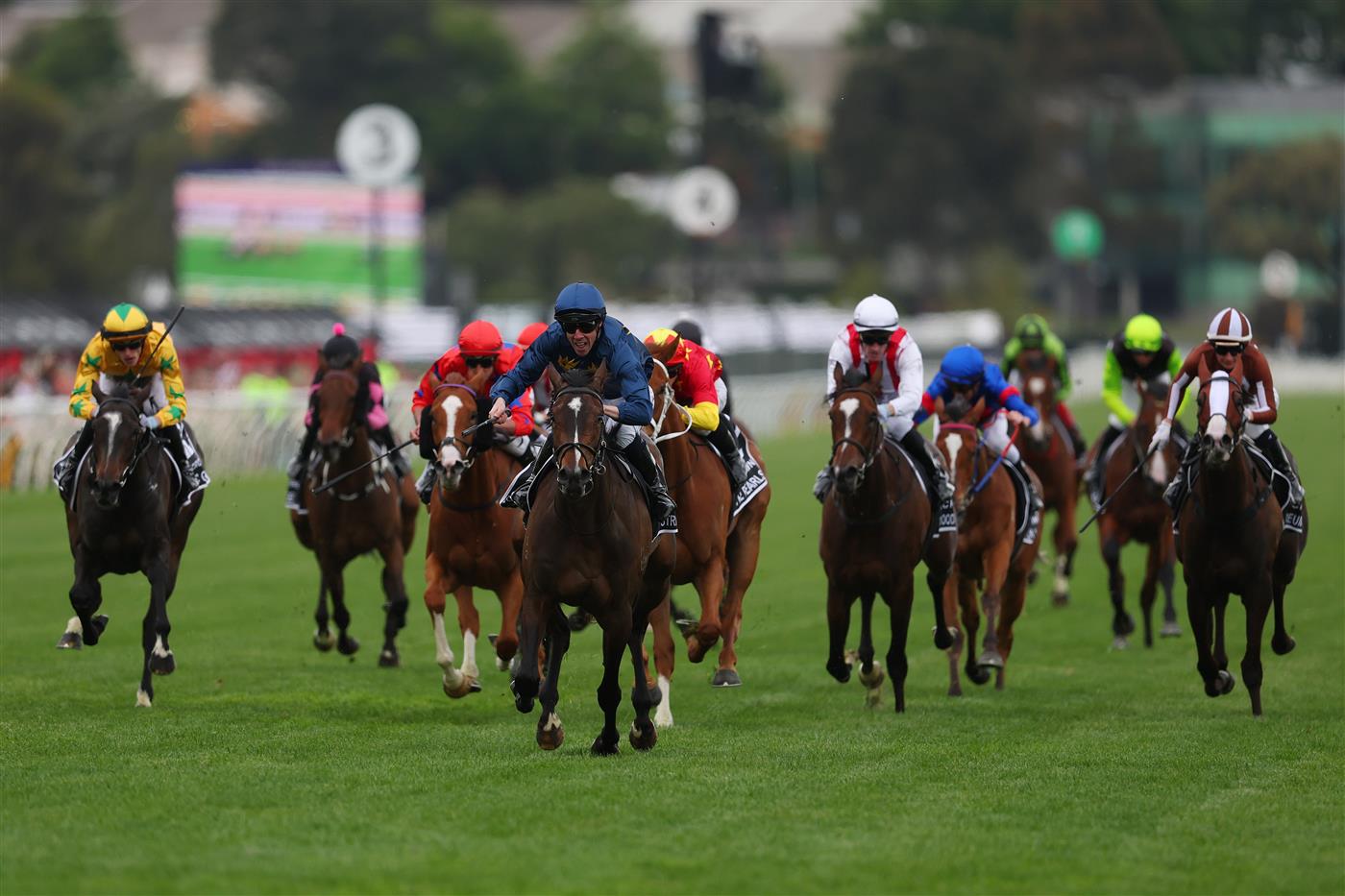 MELBOURNE, AUSTRALIA - NOVEMBER 06: John Allen rides Strictly Business to win race eight the Crown Oaks during Oaks Day at Flemington Racecourse on November 06, 2025 in Melbourne, Australia. (Photo by Morgan Hancock/Getty Images)