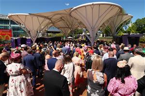 MELBOURNE, AUSTRALIA - NOVEMBER 06: Crowds queue outside the gates during Oaks Day at Flemington Racecourse on November 06, 2025 in Melbourne, Australia. (Photo by Daniel Pockett/Getty Images)
