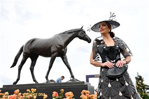 MELBOURNE, AUSTRALIA - NOVEMBER 06: Holly Keenan, Winner of the Best Dressed Grand Final at Fashions on the Field during 2025 Oaks Day at Flemington Racecourse on November 06, 2025 in Melbourne, Australia. (Photo by Wendell Teodoro/Getty Images)