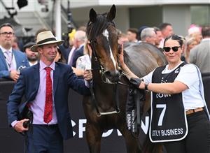 MELBOURNE, AUSTRALIA - NOVEMBER 06: Trainer Thomas Carberry poses with Strictly Business after winning Race 8, the Crown Oaks during Oaks Day at Flemington Racecourse on November 06, 2025 in Melbourne, Australia. (Photo by Vince Caligiuri/Getty Images)