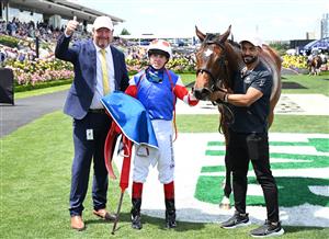 MELBOURNE, AUSTRALIA - NOVEMBER 06: Craig Williams poses with trainer Gary Portelli after riding Verona Rose to win Race 3, the Inglis Bracelet during Oaks Day at Flemington Racecourse on November 06, 2025 in Melbourne, Australia. (Photo by Vince Caligiuri/Getty Images)