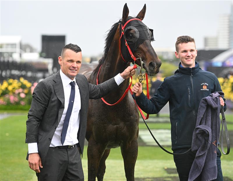 MELBOURNE, AUSTRALIA - NOVEMBER 08: Joe Pride and son Brave Pride pose with Ceolwulf after winning Race 7, the Lexus Champions Mile during Champions Day at Flemington Racecourse on November 08, 2025 in Melbourne, Australia. (Photo by Vince Caligiuri/Getty Images)