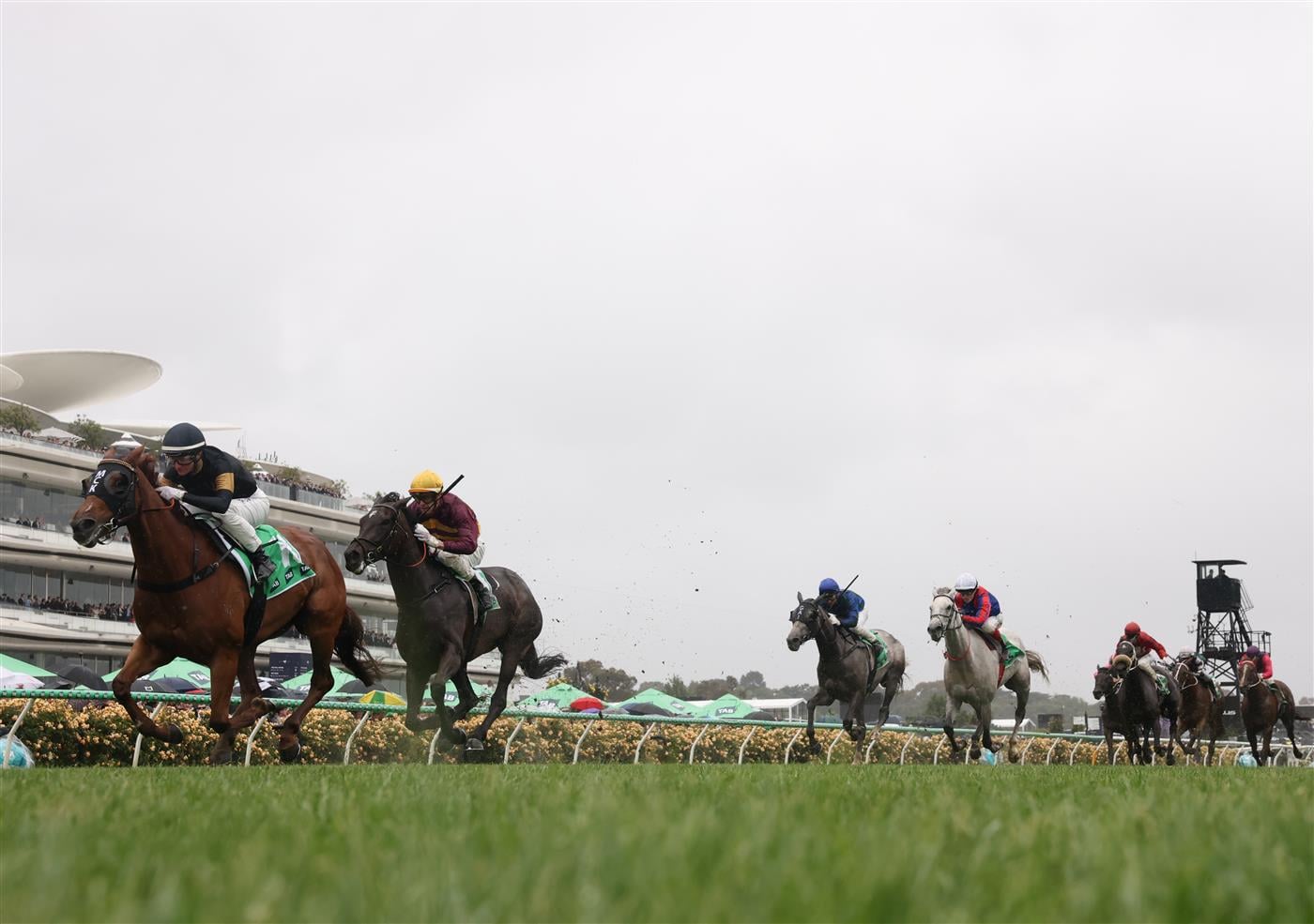 MELBOURNE, AUSTRALIA - NOVEMBER 08: Jamie Melham rides #13 Sunset Park to win race four the Tab Matriarch Stakes during Champions Day at Flemington Racecourse on November 08, 2025 in Melbourne, Australia. (Photo by Robert Cianflone/Getty Images)