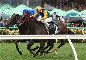 MELBOURNE, AUSTRALIA - NOVEMBER 08: Chad Schofield riding #2 Ceolwulf wins race seven the Lexus Champions Mile during Champions Day at Flemington Racecourse on November 08, 2025 in Melbourne, Australia. (Photo by Robert Cianflone/Getty Images)