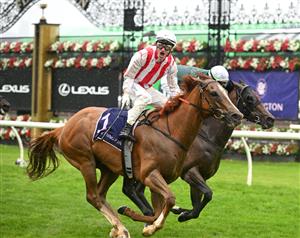 MELBOURNE, AUSTRALIA - NOVEMBER 08: Mark Zahra riding Giga Kick defeats Michael Dee riding Magic Time in Race 6, the Vrc Champions Sprint during Champions Day at Flemington Racecourse on November 08, 2025 in Melbourne, Australia. (Photo by Vince Caligiuri/Getty Images)