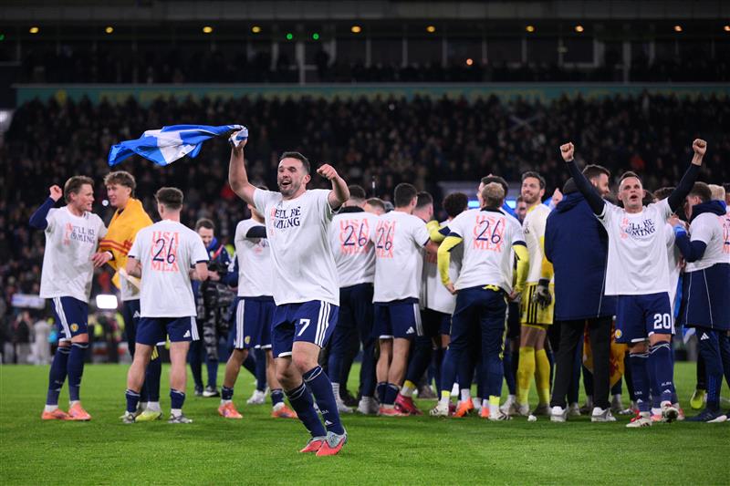 John McGinn and his Scotland team-mates celebrate (Getty Images)