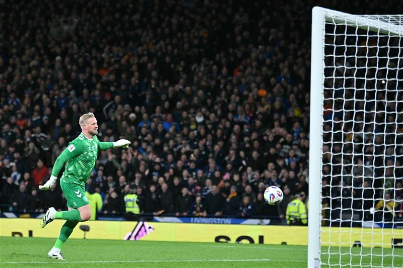 Denmark's goalkeeper Kasper Schmeichel is beaten by a long-range shot from Kenny McLean (Getty Images)