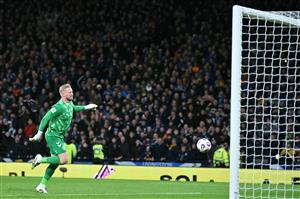 Denmark's goalkeeper Kasper Schmeichel is beaten by a long-range shot from Kenny McLean (Getty Images)