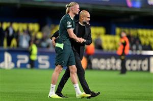 Pep Guardiola and Erling Haaland