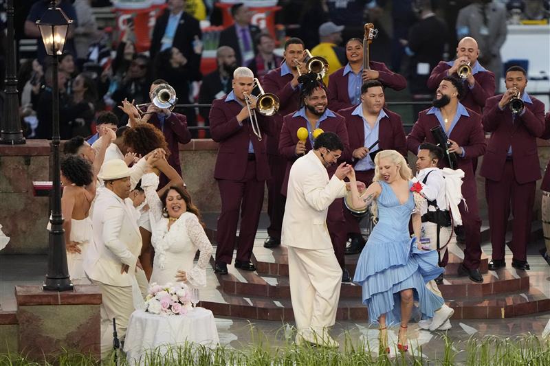 SANTA CLARA, CALIFORNIA - FEBRUARY 08: Bad Bunny and Lady Gaga perform onstage during the Apple Music Super Bowl LX Halftime Show at Levi