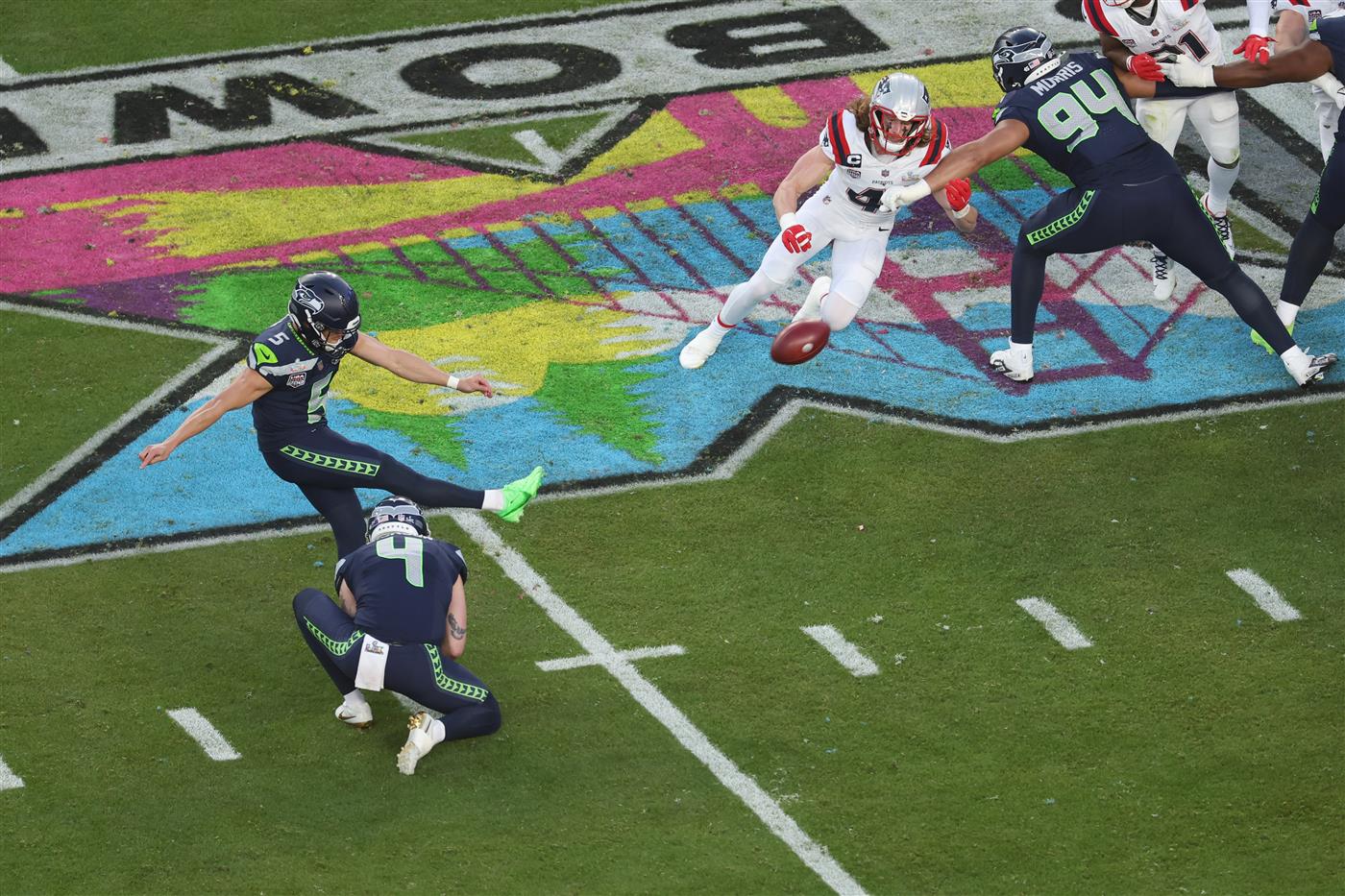SANTA CLARA, CALIFORNIA - FEBRUARY 08: Jason Myers #5 of the Seattle Seahawks kicks a field goal against the New England Patriots during the second quarter in Super Bowl LX at Levi