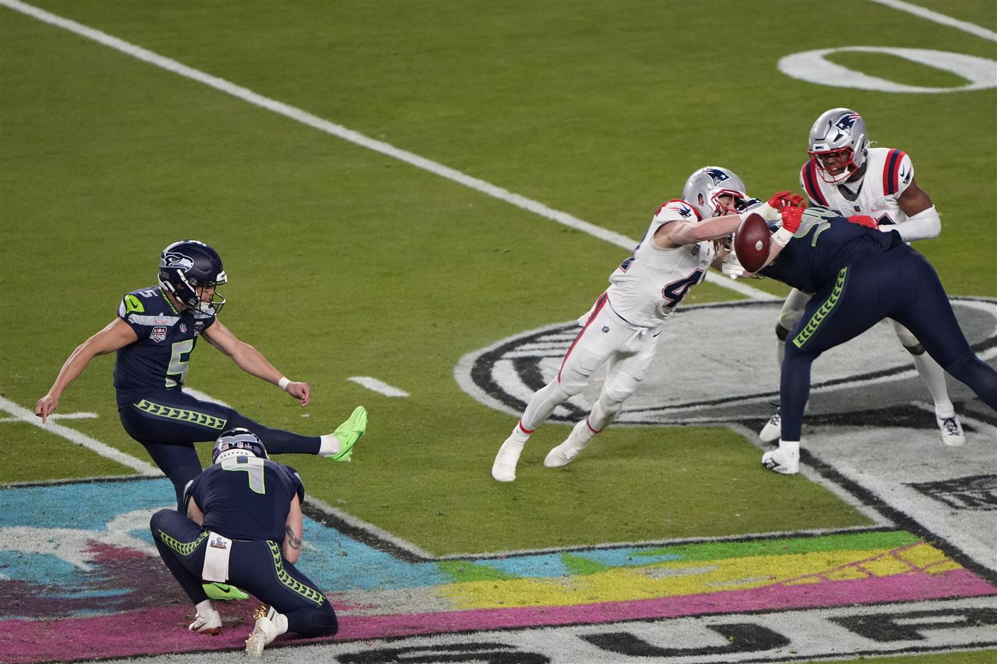 SANTA CLARA, CALIFORNIA - FEBRUARY 08: Jason Myers #5 of the Seattle Seahawks kicks his fourth field goal of the game against the New England Patriots during the third quarter in Super Bowl LX at Levi
