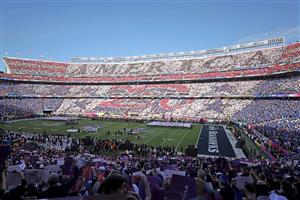 SANTA CLARA, CALIFORNIA - FEBRUARY 08: Charlie Puth performs the National Anthem during Super Bowl LX at Levi