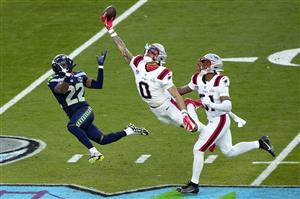 SANTA CLARA, CALIFORNIA - FEBRUARY 08: Christian Gonzalez #0 of the New England Patriots breaks up a pass intended for for Rashid Shaheed #22 of the Seattle Seahawks during the second quarter in Super Bowl LX at Levi