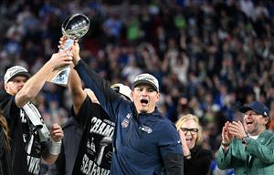 Seattle Seahawks celebrate with the Vince Lombardi Trophy after winning Super Bowl LX against the New England Patriots