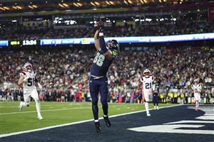 SANTA CLARA, CALIFORNIA - FEBRUARY 8: AJ Barner #88 of the Seattle Seahawks catches the ball for a touchdown during the fourth quarter of the NFL Super Bowl LX football game against the New England Patriots, at Levi