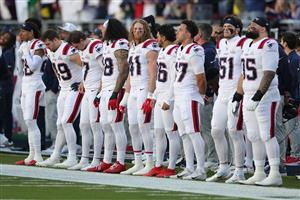 SANTA CLARA, CALIFORNIA - FEBRUARY 08: New England Patriots stand on the sideline during the first quarter of Super Bowl LX against the Seattle Seahawks at Levi