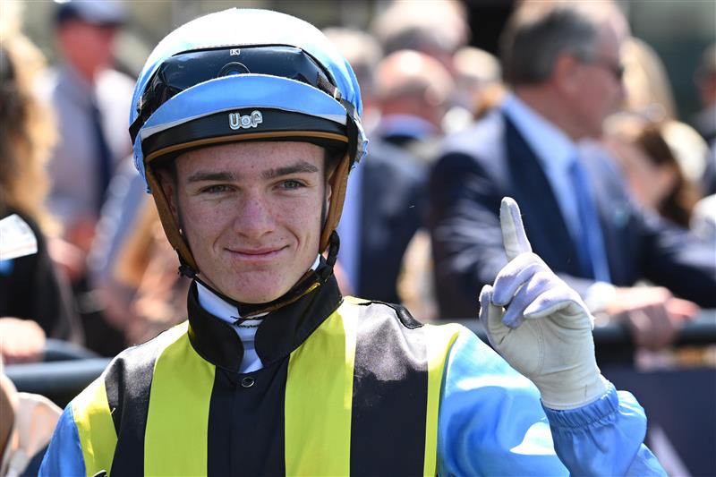MELBOURNE, AUSTRALIA - FEBRUARY 14: Luke Cartwright riding Tarvue after winning Race 2, the Tab We