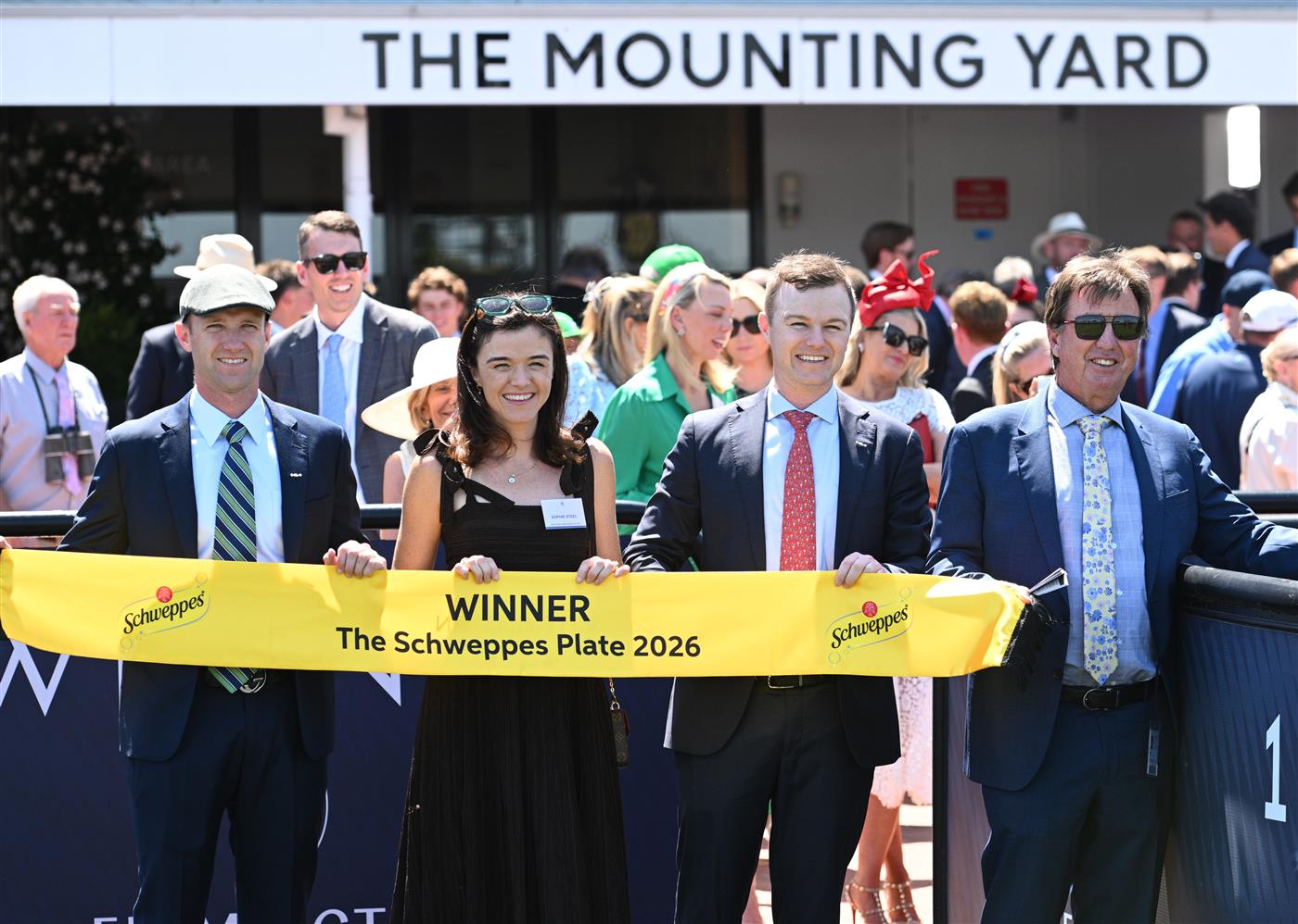 MELBOURNE, AUSTRALIA - FEBRUARY 14: JD Hayes, Sophie Steel and Ben Hayes after Ndola won Race 5, the The Schweppes Plate during Melbourne Racing at Flemington Racecourse on February 14, 2026 in Melbourne, Australia. (Photo by Vince Caligiuri/Getty Images)