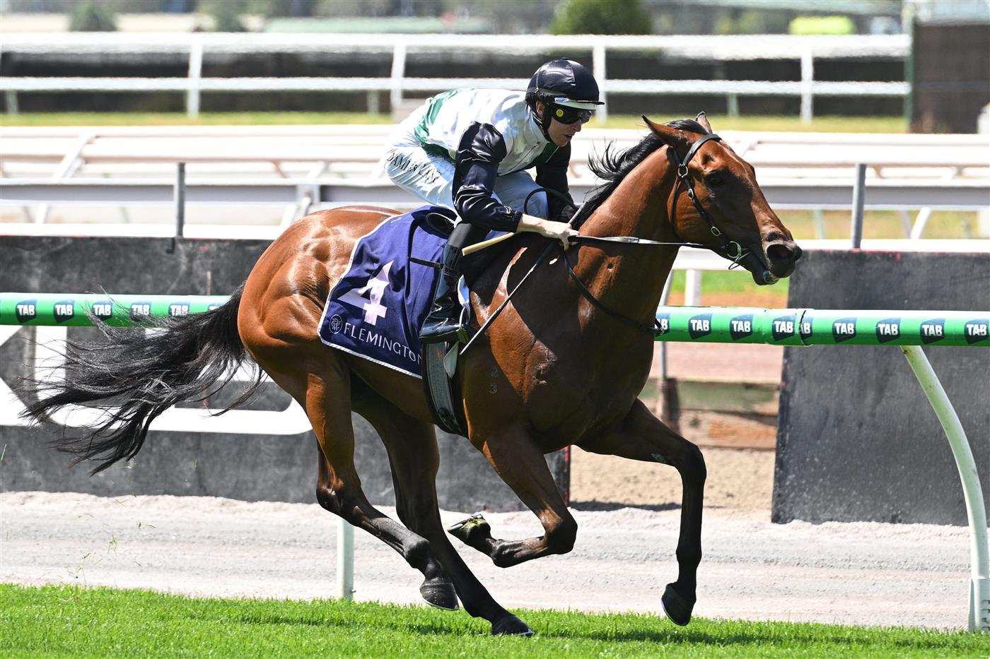 MELBOURNE, AUSTRALIA - FEBRUARY 14: Damian Lane riding Hard Kick winning Race 1, theTab Talindert Stakes during Melbourne Racing at Flemington Racecourse on February 14, 2026 in Melbourne, Australia. (Photo by Vince Caligiuri/Getty Images)