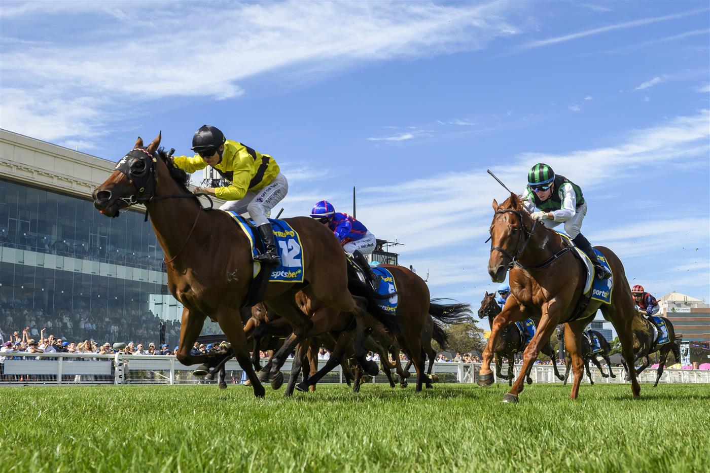 MELBOURNE, AUSTRALIA - FEBRUARY 21: Ben Melham riding Streisand defeats Closer To Free (r) and Guest House in Race 8, the Sportsbet Blue Diamond Stakes during Melbourne Racing at Caulfield Racecourse on February 21, 2026 in Melbourne, Australia. (Photo by Vince Caligiuri/Getty Images)