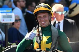 MELBOURNE, AUSTRALIA - FEBRUARY 21: Zac Spain riding Sheza Alibi after winning Race 5, the Sportsbet Angus Armanasco Stakes during Melbourne Racing at Caulfield Racecourse on February 21, 2026 in Melbourne, Australia. (Photo by Vince Caligiuri/Getty Images)
