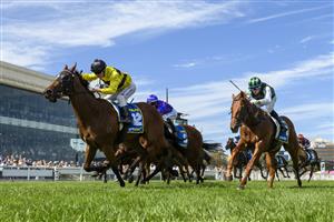 MELBOURNE, AUSTRALIA - FEBRUARY 21: Ben Melham riding Streisand defeats Closer To Free (r) and Guest House in Race 8, the Sportsbet Blue Diamond Stakes during Melbourne Racing at Caulfield Racecourse on February 21, 2026 in Melbourne, Australia. (Photo by Vince Caligiuri/Getty Images)