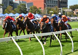 MELBOURNE, AUSTRALIA - FEBRUARY 21: Daniel Stackhouse riding Bossy Benita wins Race 6, the Catanach