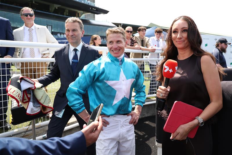 SYDNEY, AUSTRALIA - MARCH 07: Wife and presenter Katie McDonald interviews after James McDonald riding Chayan  win Race 3 Petaluma Reisling Stakes during Sydney Racing at Royal Randwick Racecourse on March 07, 2026 in Sydney, Australia. (Photo by Jeremy Ng/Getty Images)