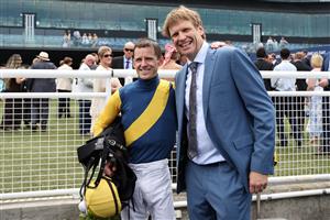 SYDNEY, AUSTRALIA - MARCH 07: Trainer Bjorn Baker speaks to the media after watching Jason Collett riding Paradoxium win Race 4 Darley Todman Stakes during Sydney Racing at Royal Randwick Racecourse on March 07, 2026 in Sydney, Australia. (Photo by Jeremy Ng/Getty Images)