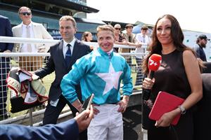 SYDNEY, AUSTRALIA - MARCH 07: Wife and presenter Katie McDonald interviews after James McDonald riding Chayan  win Race 3 Petaluma Reisling Stakes during Sydney Racing at Royal Randwick Racecourse on March 07, 2026 in Sydney, Australia. (Photo by Jeremy Ng/Getty Images)