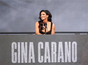 Gina Carano speaks onstage during Netflix's Ronda Rousey x Gina Carano Los Angeles MMA Press Conference at Intuit Dome on March 10, 2026 in Inglewood, California. (Getty Images for Netflix)
