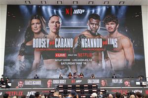 Francis Ngannou, Ronda Rousey, Gina Carano, and Philipe Lin speak onstage during  Netflix's Ronda Rousey x Gina Carano Los Angeles MMA Press Conference at Intuit Dome on March 10, 2026 in Inglewood, California. (Getty Images for Netflix)
