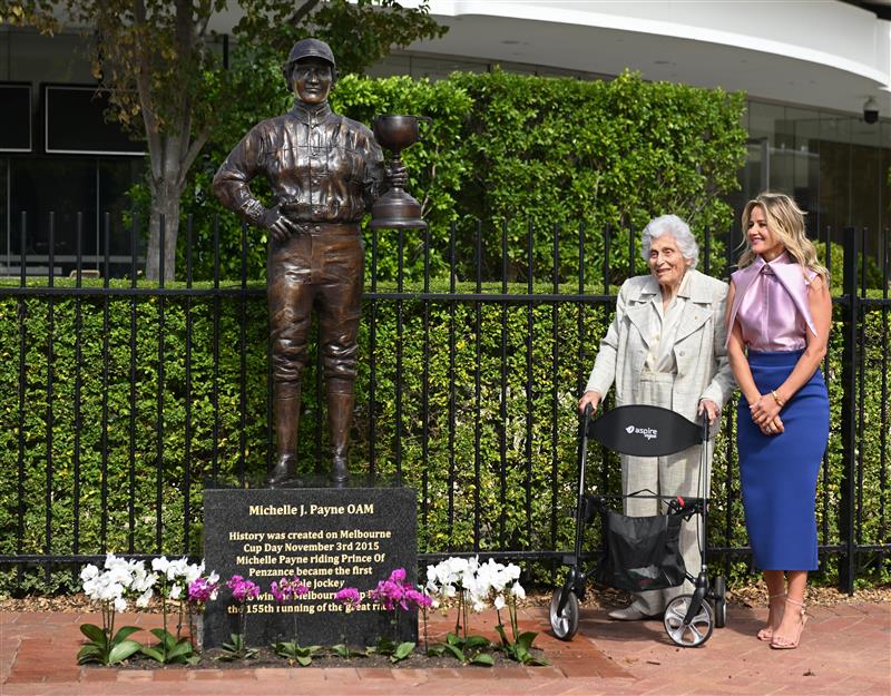 MELBOURNE, AUSTRALIA - MARCH 26: Michelle Payne, the first female jockey to win Australia’s most iconic race, the Lexus Melbourne Cup aboard Prince of Penzance poses with Lady Southey during the official unveiling of the Michelle Payne Statue at Flemington Racecourse on March 26, 2026 in Melbourne, Australia. (Photo by Vince Caligiuri/Getty Images)