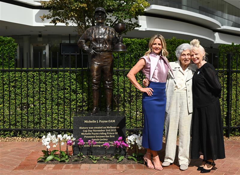 MELBOURNE, AUSTRALIA - MARCH 26: Michelle Payne, the first female jockey to win Australia’s most iconic race, the Lexus Melbourne Cup aboard Prince of Penzance poses with acclaimed artist Judith Leman (r) and philanthropist Lady Marigold Southey AC during the official unveiling of the Michelle Payne Statue at Flemington Racecourse on March 26, 2026 in Melbourne, Australia. (Photo by Vince Caligiuri/Getty Images)