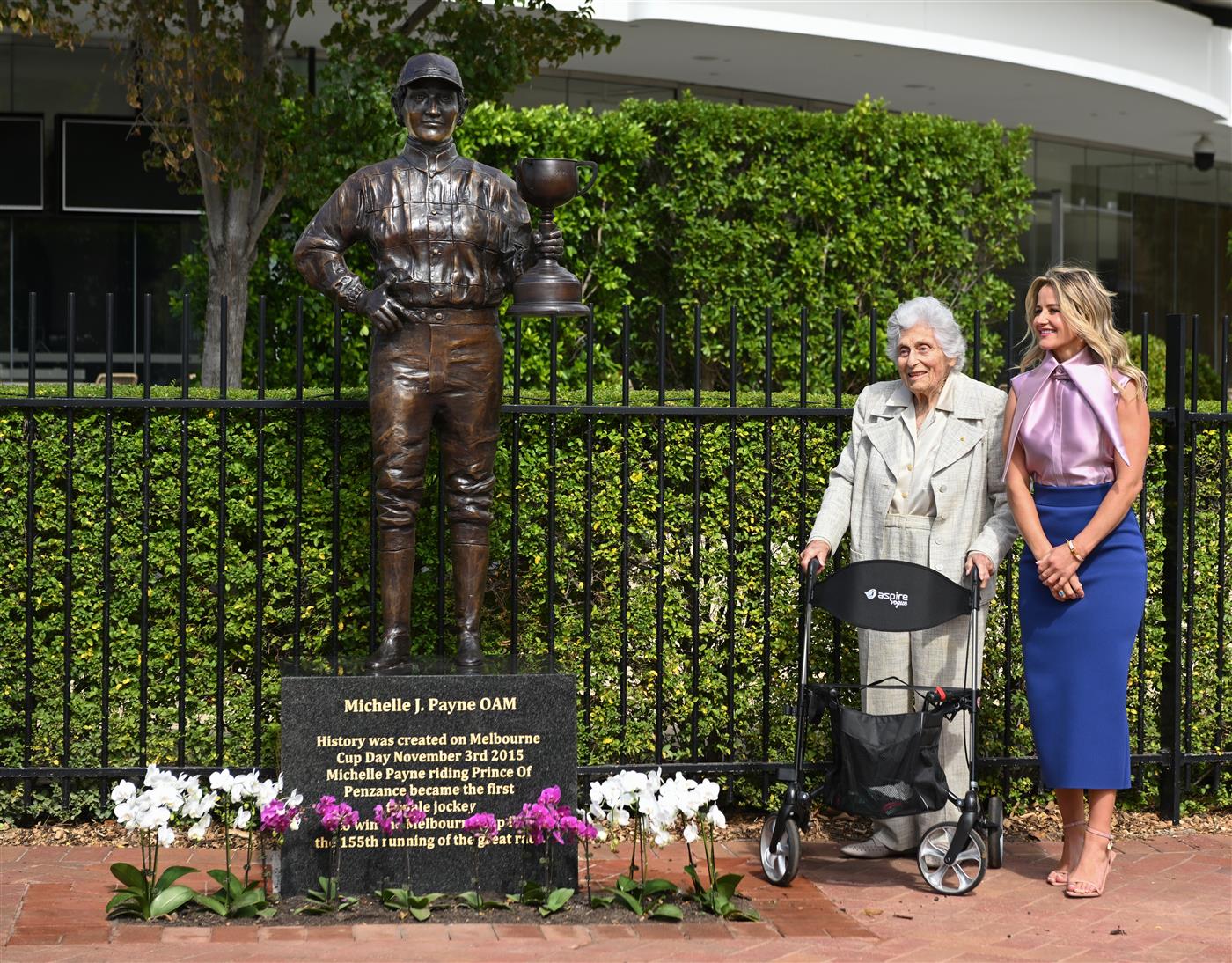 MELBOURNE, AUSTRALIA - MARCH 26: Michelle Payne, the first female jockey to win Australia’s most iconic race, the Lexus Melbourne Cup aboard Prince of Penzance poses with Lady Southey during the official unveiling of the Michelle Payne Statue at Flemington Racecourse on March 26, 2026 in Melbourne, Australia. (Photo by Vince Caligiuri/Getty Images)