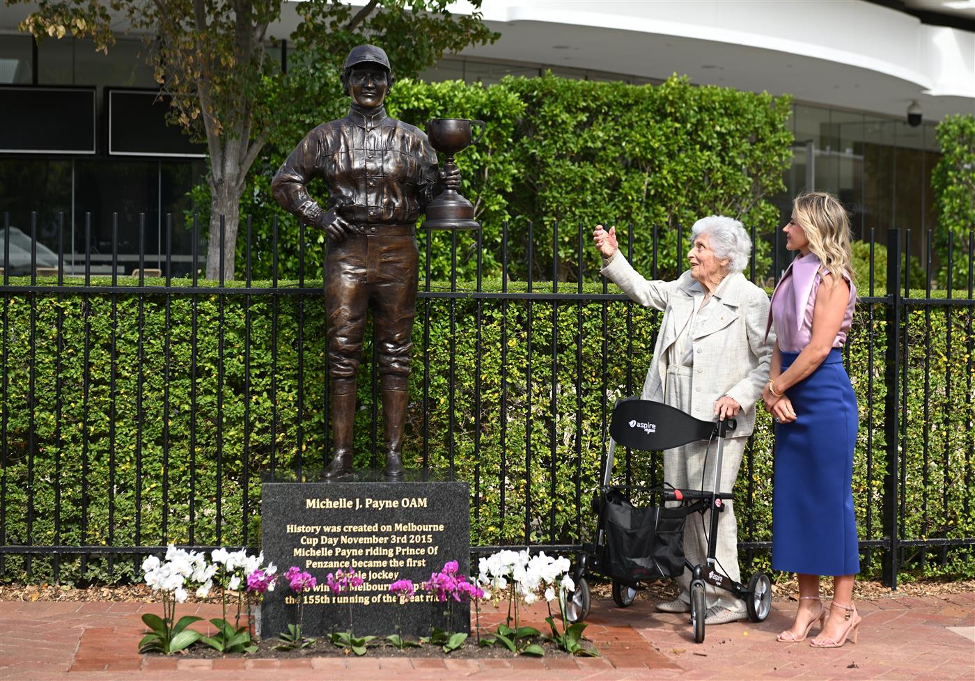MELBOURNE, AUSTRALIA - MARCH 26: Michelle Payne, the first female jockey to win Australia’s most iconic race, the Lexus Melbourne Cup aboard Prince of Penzance poses with Lady Southey during the official unveiling of the Michelle Payne Statue at Flemington Racecourse on March 26, 2026 in Melbourne, Australia. (Photo by Vince Caligiuri/Getty Images)