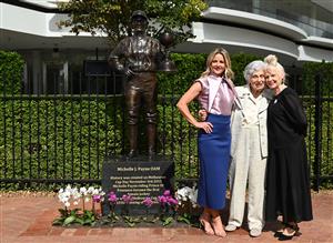 MELBOURNE, AUSTRALIA - MARCH 26: Michelle Payne, the first female jockey to win Australia’s most iconic race, the Lexus Melbourne Cup aboard Prince of Penzance poses with acclaimed artist Judith Leman (r) and philanthropist Lady Marigold Southey AC during the official unveiling of the Michelle Payne Statue at Flemington Racecourse on March 26, 2026 in Melbourne, Australia. (Photo by Vince Caligiuri/Getty Images)