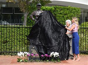 MELBOURNE, AUSTRALIA - MARCH 26: Michelle Payne, the first female jockey to win Australia’s most iconic race, the Lexus Melbourne Cup aboard Prince of Penzance poses with Lady Southey during the official unveiling of the Michelle Payne Statue at Flemington Racecourse on March 26, 2026 in Melbourne, Australia. (Photo by Vince Caligiuri/Getty Images)